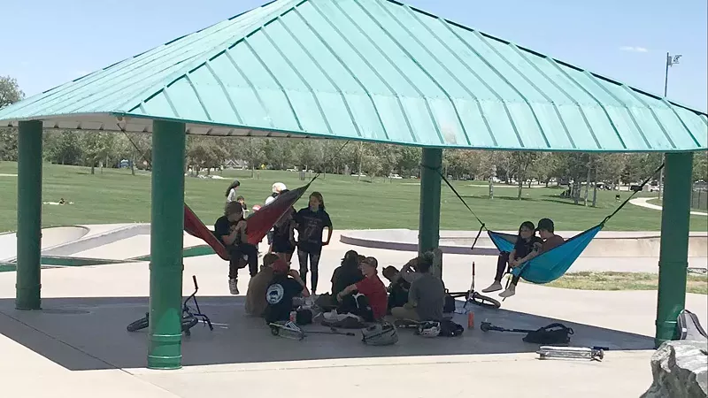 Image: A group of mask-free teen skaters at Clement Park on June 7, 2020.