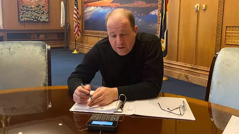 Image: Governor Jared Polis on the job in the Capitol.