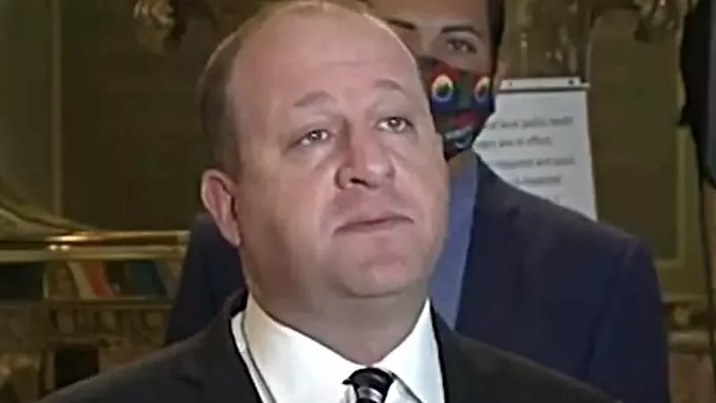 Image: Colorado Governor Jared Polis at a recent bill-signing.