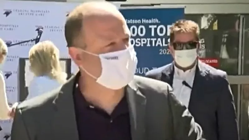 Image: Governor Jared Polis during a visit to Rose Medical Center this week.