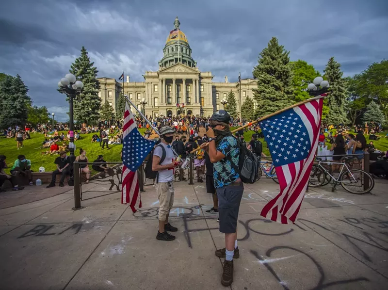 Image: An image from our slideshow "Day Four of Peaceful Protests Turns Violent at Night."