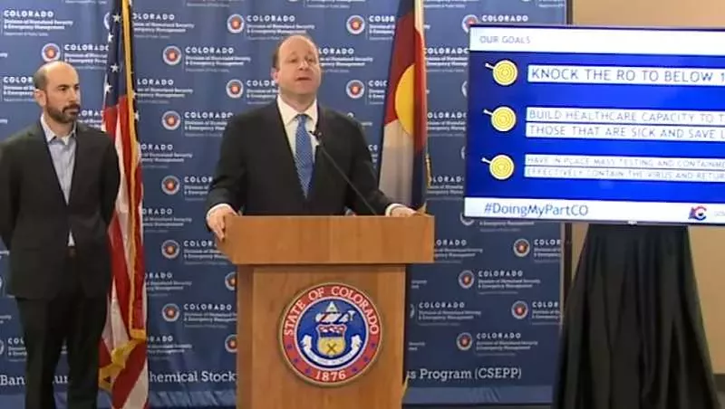 Image: Governor Jared Polis and Scott Bookman, the incident commander for Colorado's COVID-19 response, at an Emergency Operations Center press conference on April 1.