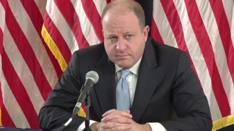 Image: Governor Jared Polis during his November 24 press conference.