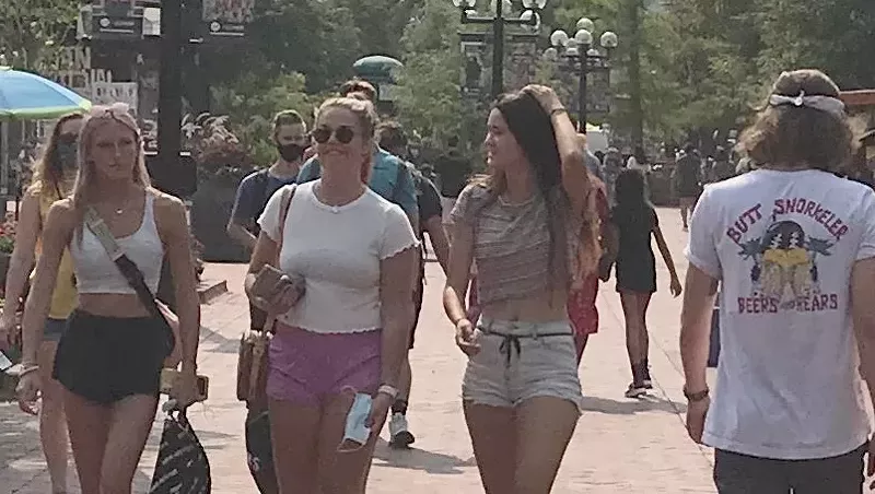 Image: Mask use and social distancing were spotty on the Pearl Street Mall on August 22.