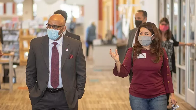 Image: Denver Mayor Michael Hancock touring the new community-based vaccine clinic at Barnum rec center on March 10.