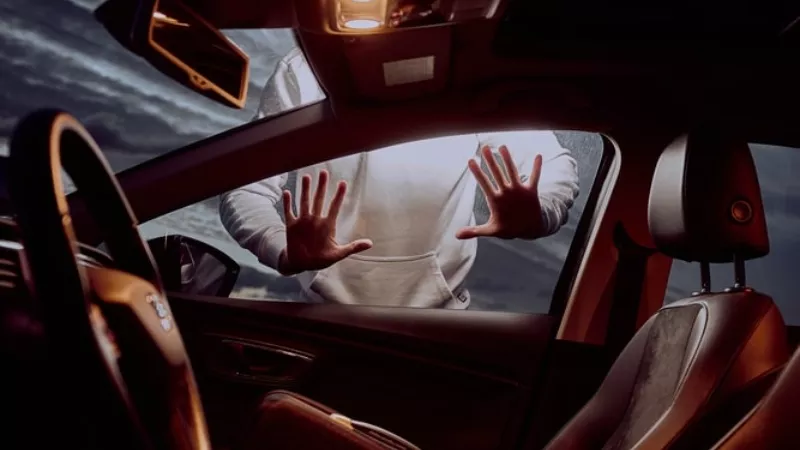 Image: Photo illustration of a car theft.