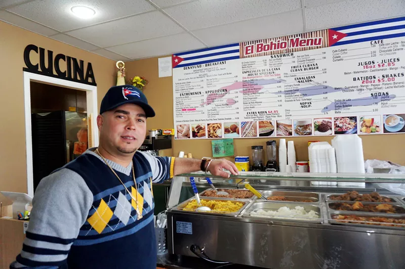 Image: Greico Herrada serves the food of his home country at El Bohio Criollo.
