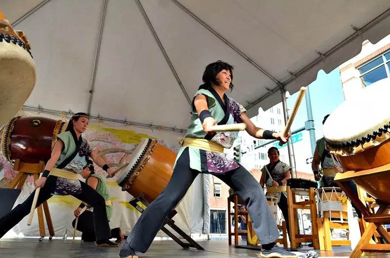Image: A person with drum sticks