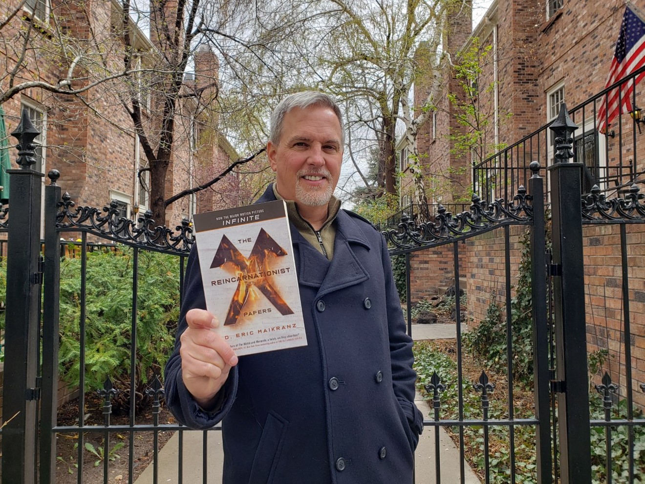 D. Eric Maikranz and his novel at home in Denver.