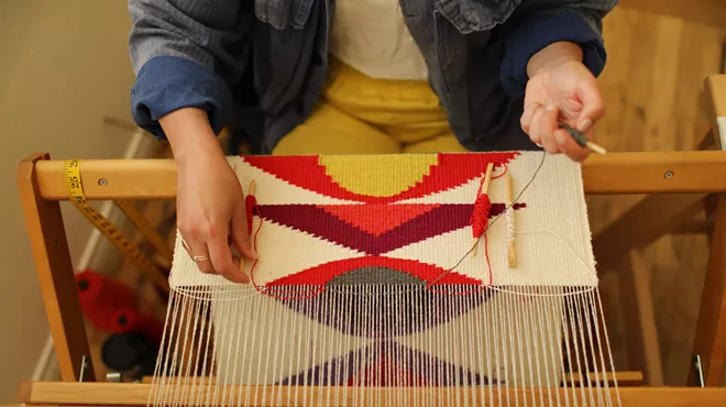 woman at a loom