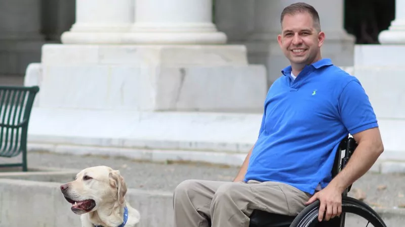 Image: Councilman Chris Hinds uses a wheelchair to get around.