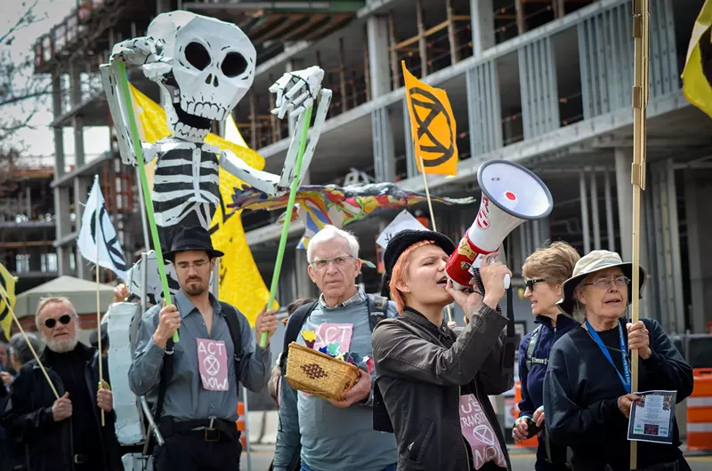 Image: Denver Extinction Rebellion activists led a "Funeral Procession for the Earth" from Representative Diana DeGette's office in April.