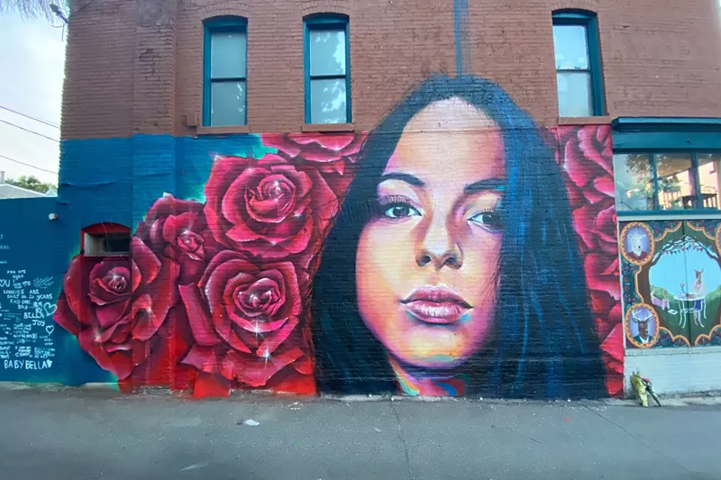 Image: A mural depicting Isabella Joy Thallas, painted by Thomas "Detour" Evans.