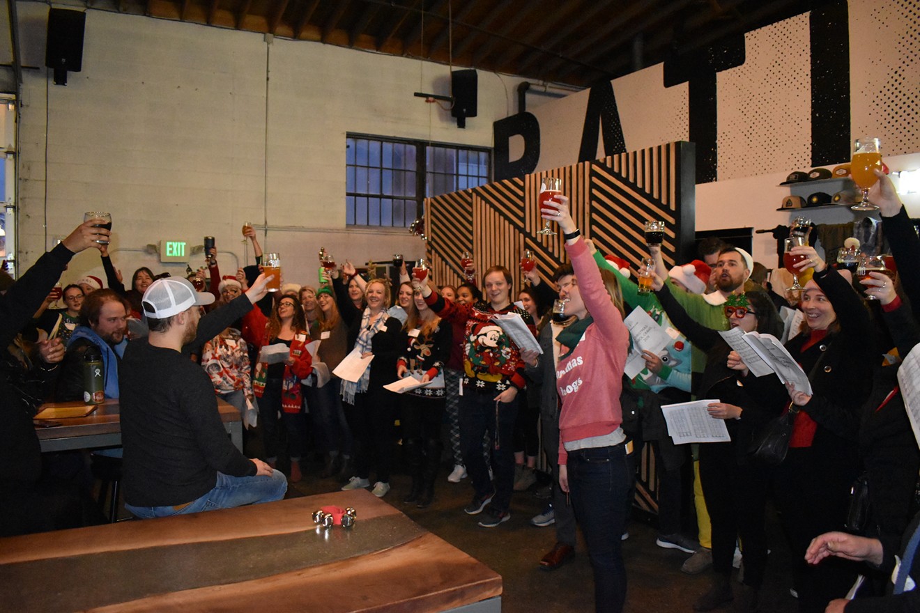 DCL performing their Christmas Carol Crawl at Ratio Brewery in 2019.