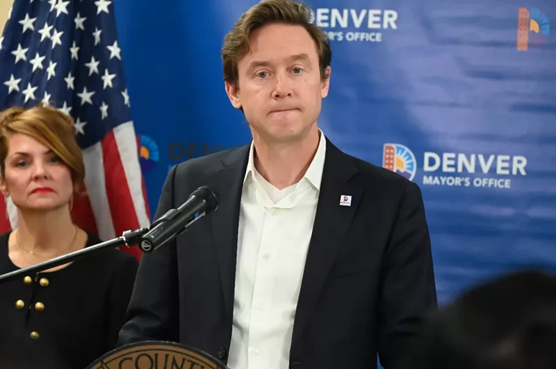 Image: Mayor Mike Johnston stands with Councilwoman Amanda Sandoval behind him.