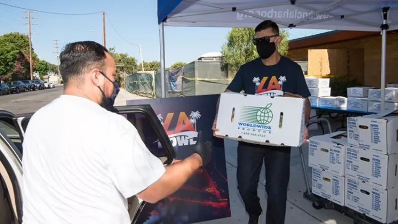 Image: For the Farmers to Families Food Boxes program, the U.S. Department of Agriculture works with local groups such as the Denver Community Food Access Coalition.