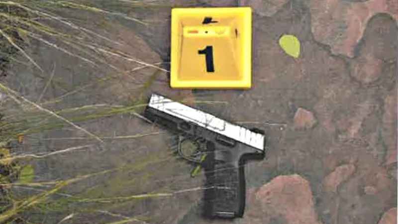 Image: A gun found near the body of Trevante Johnson, who was shot and killed by a Denver police officer on July 31, 2018.