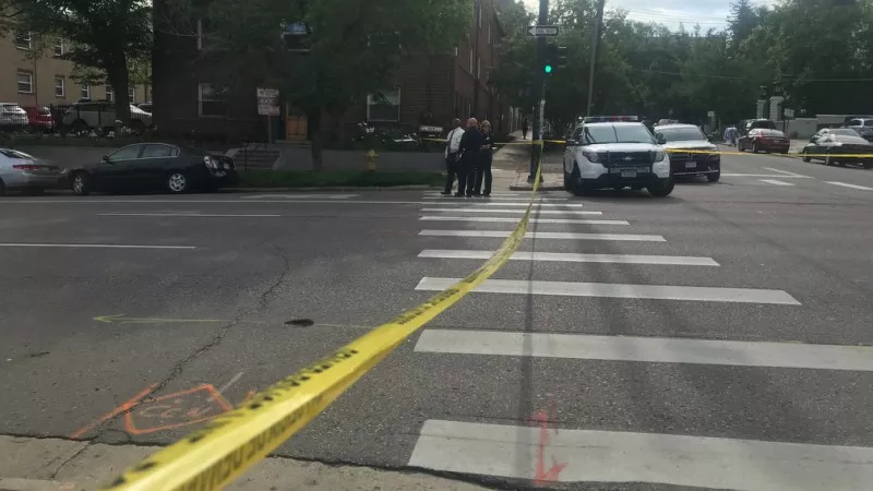 Image: Crime scene tape along 10th across Lincoln.