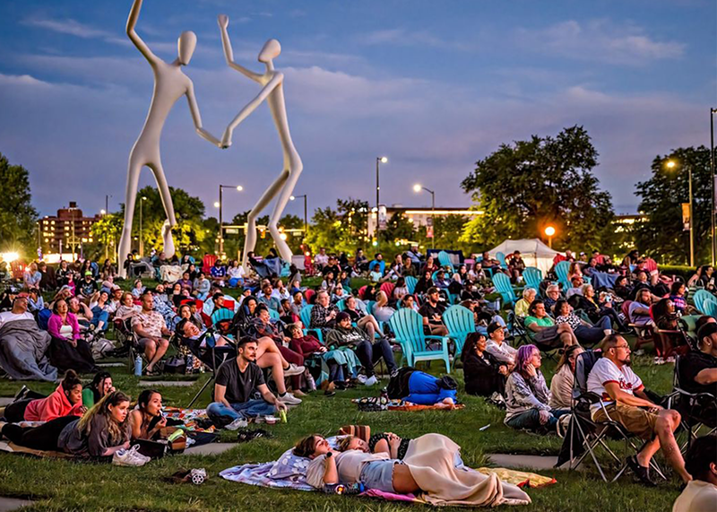 Filmgoers at Sunset Cinema in the Denver Sculpture Park.