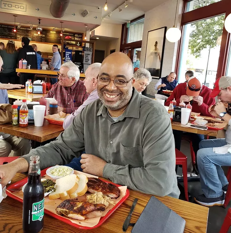 Image: Adrian Miller enjoys some in-depth research into Black-owned barbecue restaurants.