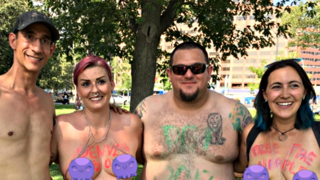 Matt Wilson and Mia Jean, left, join other participants at Denver Go Topless Day 2017.