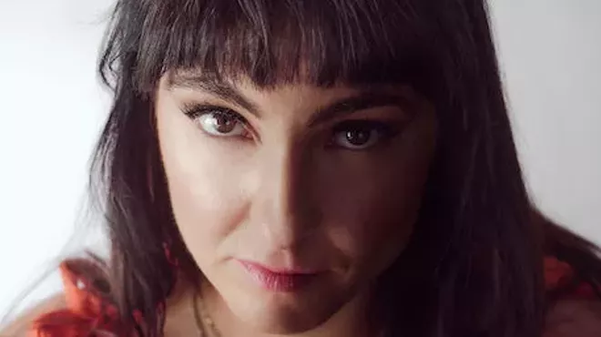 A woman with bangs