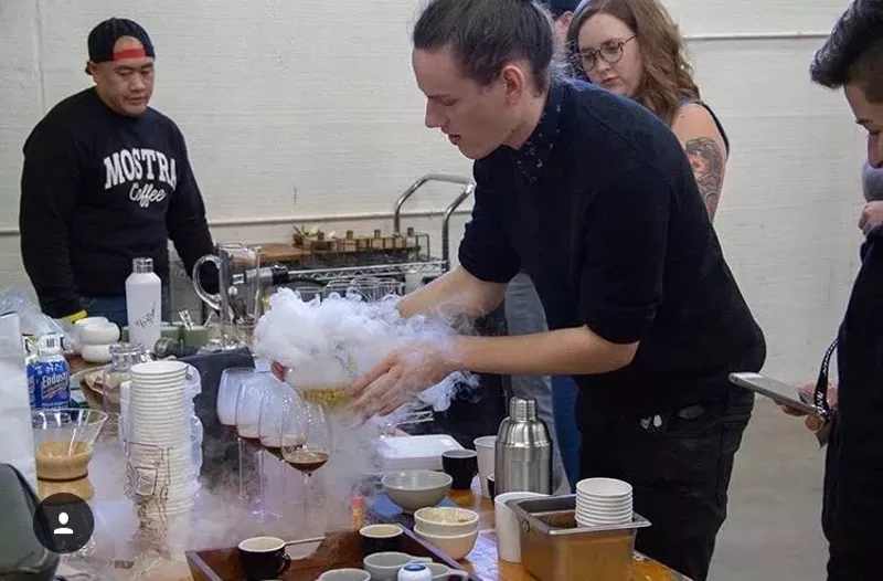 Image: Sam Neely competes for the top spot as barista at the CoffeeChamps competition earlier this month.