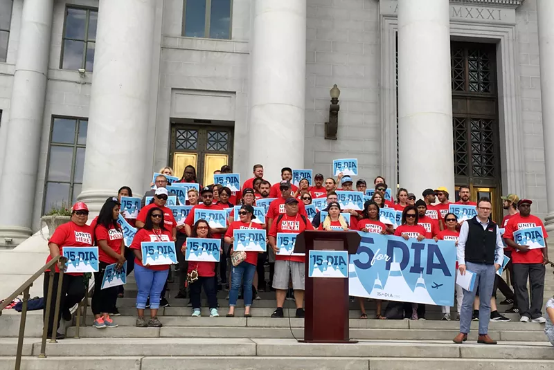 Image: Airport workers gathered at the Denver City and County Building on August 23 to announce the signature-gathering effort.