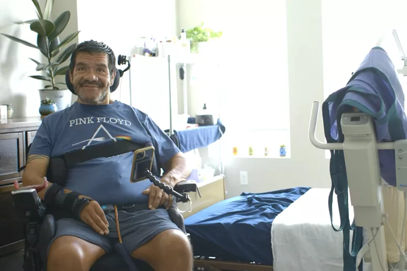 Image: Tim Valdez pictured in his electric wheelchair.