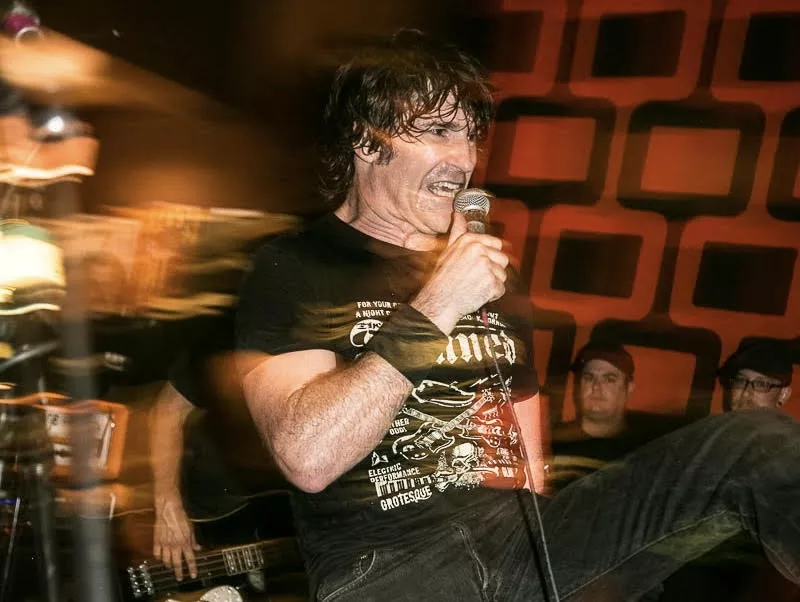 Image: Abe Brennan singing onstage