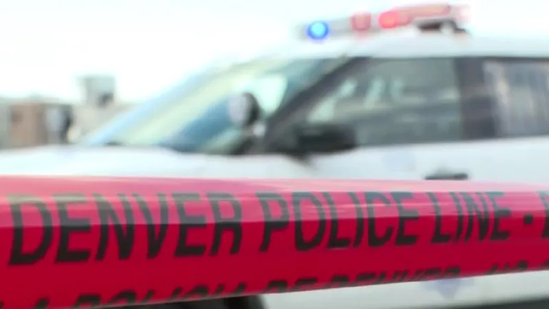 Image: The police line near a fatal stabbing in Globeville on July 30.