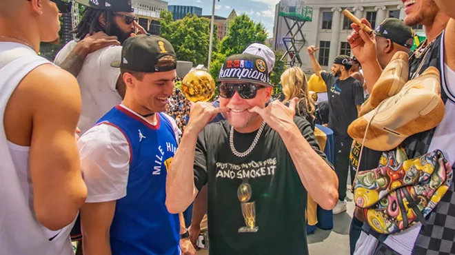 Nuggets coach Mike Malone during 2023 championship parade