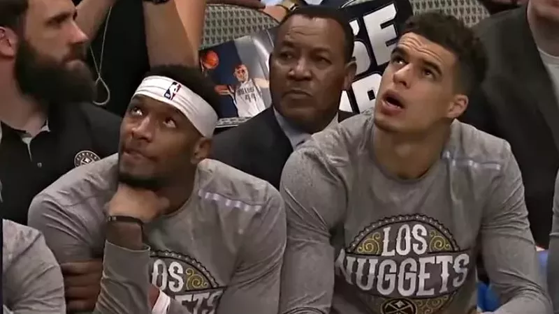Image: Denver Nuggets Torrey Craig and Michael Porter Jr. during a March 11 match-up with the Dallas Mavericks — the last game played prior to the suspension of the NBA season because of COVID-19.