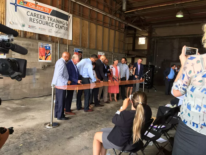 Image: Mayor Michael B. Hancock cutting the ribbon at the July 6 announcement of CDOT's new public-private career-training building.