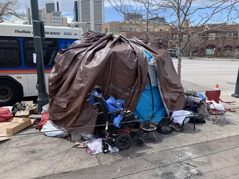 Image: Tents like this one set up near 22nd and Curtis sttreet are scattered throughout Five Points.