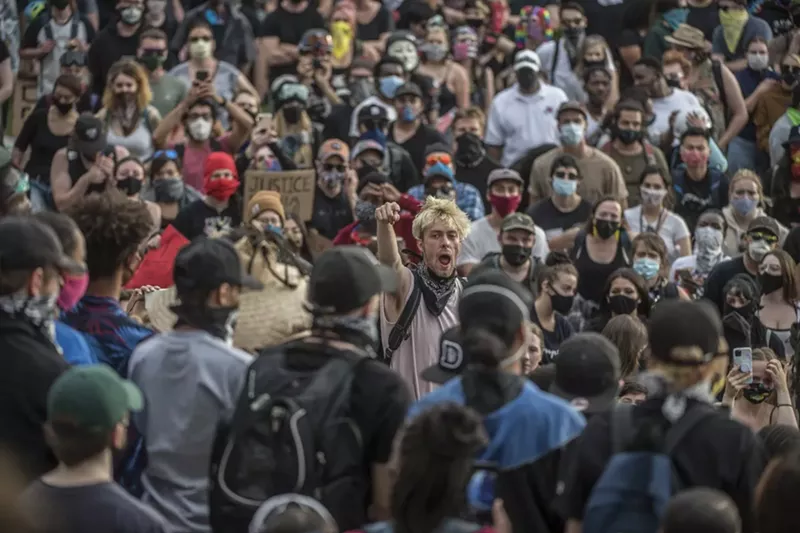 Image: A photo from our slide show "Day Four of Peaceful Protests Turns Violent at Night."
