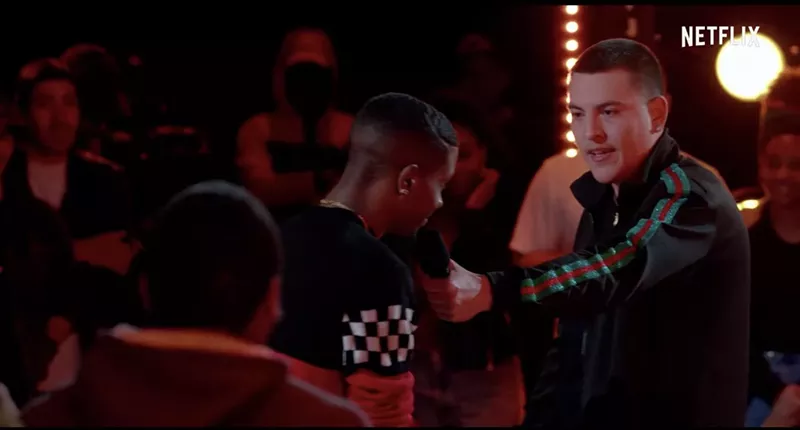 Image: Denver rapper Jakob Campbell engages in a rap battle with another contestant on Rhythm + Flow.