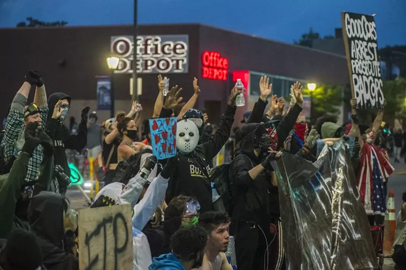 Image: A photo from our slideshow "Day Four of Peaceful Protests Turns Violent at Night."