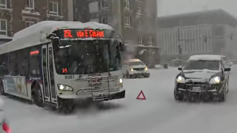 Image: A Denver bus stuck in yesterday's snowstorm.