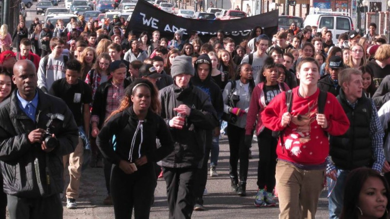 Denver East students during the December 2014 #HandsUpWalkOut march in solidarity with Ferguson, Mike Brown and Eric Garner.