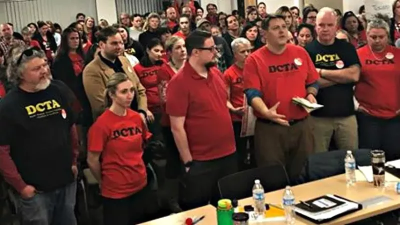 Image: Members of the Denver Classroom Teachers Association negotiating team at a January gathering.