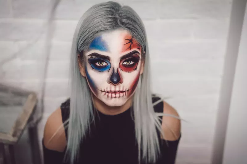 Image: woman with painted face for halloween