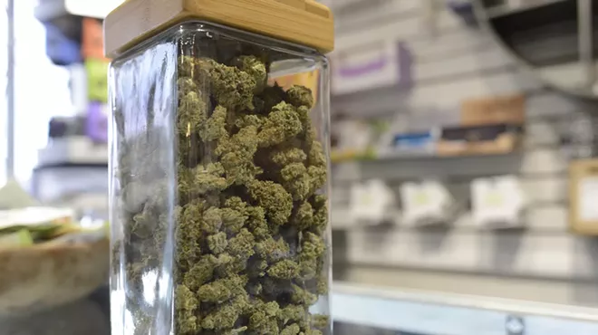 A jar of weed inside of a Denver dispensary