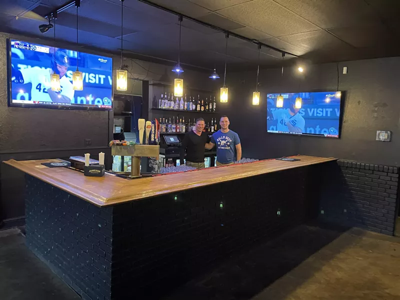 Image: Owner Steven Alix (left) and bartender Cody G at Tight End, the new gay sports bar at the former Streets Denver space.