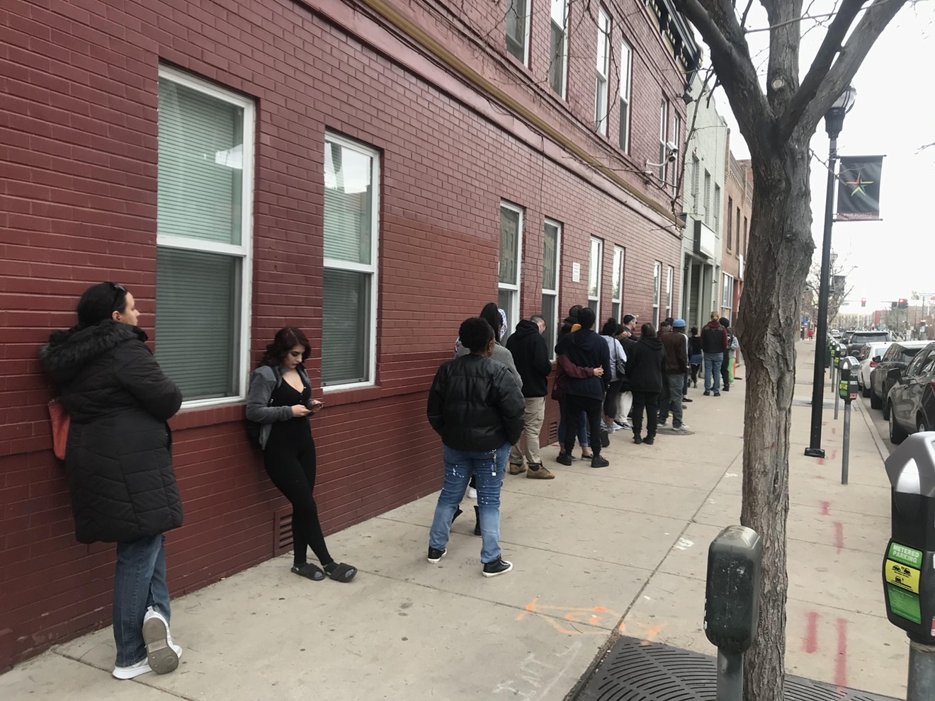 The line outside of Denver Kush Club after Mayor Michael Hancock’s original order to close dispensaries at 5 p.m. March 24.