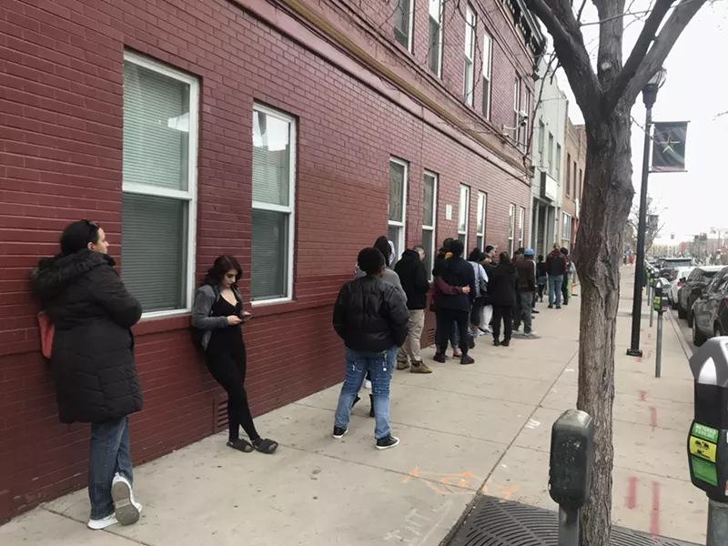 Image: The line outside of Denver Kush Club after Mayor Michael Hancock’s original order to close dispensaries at 5 p.m. March 24.