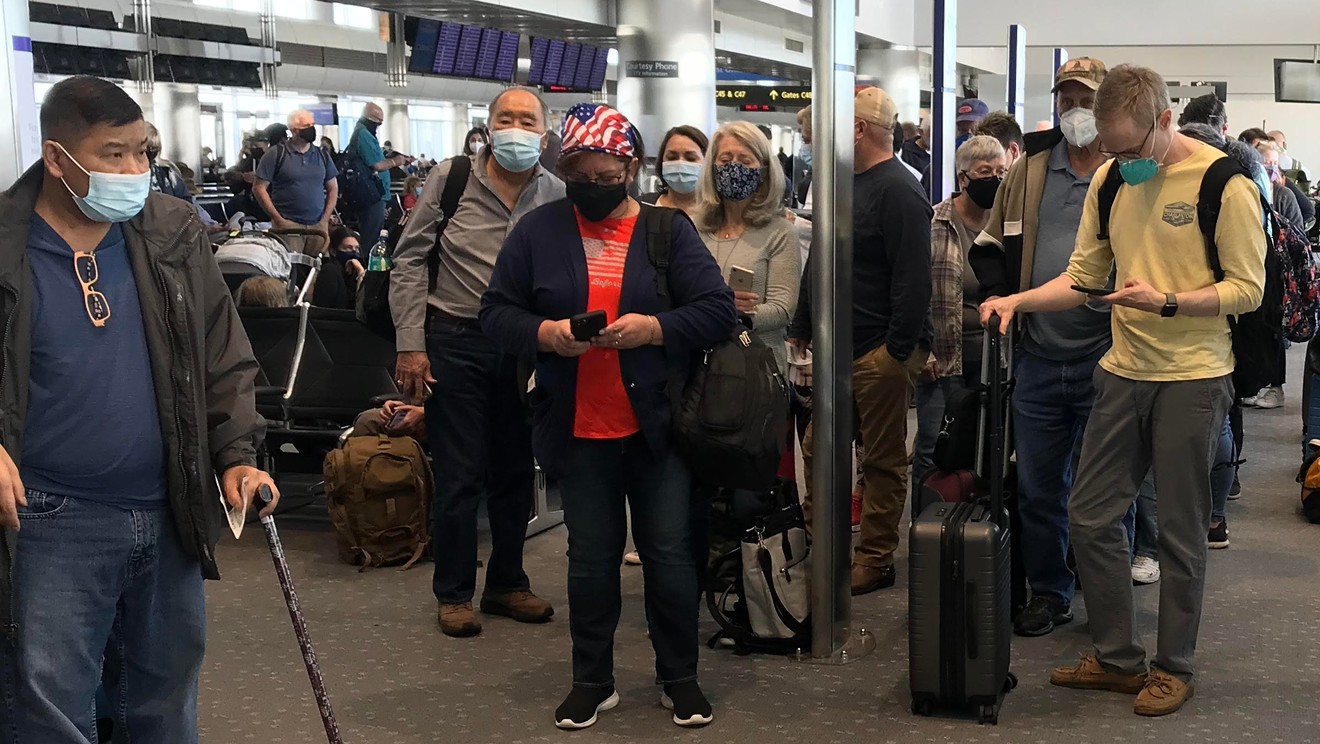 Customers lined up to board a Southwest flight at Denver International Airport on May 7.
