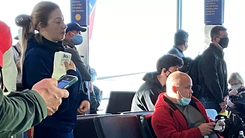 Image: Masks were seen going south at Denver International Airport.