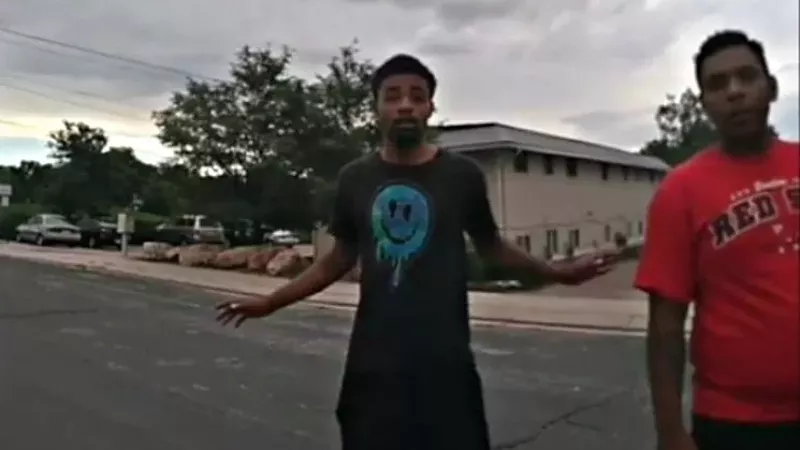 Image: De'Von Bailey, left, and his cousin Lawrence Stoker as seen in police body-camera footage captured shortly before the August 3 shooting.