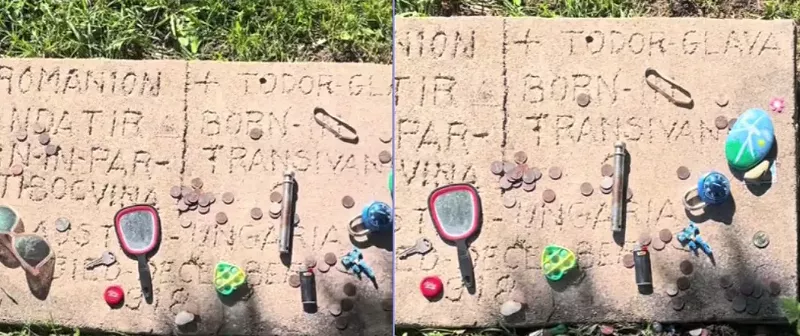 Image: headstone in a cemetery with trinkets on it